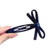 Pinza para el pelo con lazo de tela azul marino con un diseño sencillo para mujer, adecuada para recoger el flequillo y adecuada para el uso diario, un accesorio para el cabello elegante