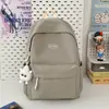2026 Nueva Moda Casual Mochila Escolar Estilo Coreano Color Sólido Fresco Mochila para Estudiantes de Secundaria y Universidad Mochila de Campus para Mujeres