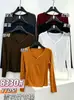 Camiseta ajustada de manga larga con cuello en V, estilo americano picante, de color liso, adelgazante, top versátil para llevar debajo