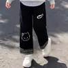 Conjunto de dos piezas para niñas estilo universitario 2026, versátil, con bloques de color a rayas, estampado de gatitos y pantalones casuales