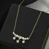 Outono e inverno Novo Estilo Micro cravejado com zircônia corrente de suéter elegante feminina design de nicho sentido pingente de gota d'água corrente de clavícula colar versátil