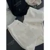 Recomendación PrincipalColección Nueva Primavera/Verano 26 de Yuran: Jeans de Algodón Orgánico Estructurados con Corte Dividido y Dobladillo Curvo hasta el Suelo
