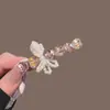Presilha de Cabelo Laço Pérola Cristal Coração Amor Coreano Luxo Leve Doce Menina High-End Para Franja Presilha Bico de Pato