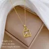 [Aço titânio] AMOR bloqueio de chave Dança luz de luxo elegante lindo colar de diamante cheio de todas as mulheres de todos os jogos clavícula cadeia de aço de titânio