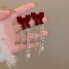 Pendientes de borlas con perlas y lazo rojo flocado 2024 para mujer, elegantes, ligeros y lujosos, de Corea del Sur, largos y con un toque de distinción.