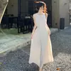 Envío Gratis Vestido de Alta Calidad para Mujer en Verano, Hermoso Estilo Nuevo de Tirantes Halter Estilo Francés Vestido Largo para Vacaciones en la Costa