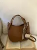 Bolso Pequeño Retro Coreano de Mano para Mujer 2025 Nuevo Bolso de Hombro Cruzado Versátil de Gama Alta Bolso Tote Tipo Cubo