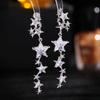 Pendientes de diseño de lujo, ligeros, con estrellas brillantes, temperamento de alta gama, aguja plateada, estrella de cinco puntas, circonita, largos, meteorito.