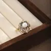 Anillo vintage de perlas estilo francés para mujer, lujo ligero con sensación de alta gama, diseño de anillo ajustable, estilo nicho, venta al por mayor de accesorios para anillos