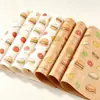 Papel a prueba de grasa para alimentos en stock, papel para empaque de hamburguesas, pollo frito y bolas de arroz, fábrica de impresión fuente para catering y comida para llevar
