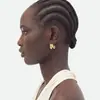 Europa y Estados Unidos transfronterizos aretes de oro de 18k titanio acero irregular curvos aretes para mujer simples estilo ins sensación de lujo ligero alta gama