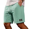 2026 Amazon Nuevos Pantalones Cortos Bermuda Casuales de Color Sólido Ajuste Holgado para Hombre de Algodón y Lino con Cordón Pantalones Cortos de Playa