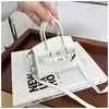 Colección nueva 2025: bolsos de mano elegantes y modernos para mujer, con material de PU de colores de caramelo, minibolso bandolera y monederos lindos