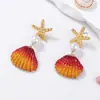 Tendencia de personalidad transfronteriza océano único diseño creativo sentido del color concha de color imitación perla estrella de mar aretes femeninos