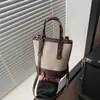Sucesso transfronteiriço de 2025: bolsa balde color block, bolsa de ombro versátil, bolsa transversal, bolsa para o dia a dia, estilo minimalista urbano e de alta qualidade