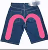 Marca de moda hip-hop europea y americana transfronteriza shorts de mezclilla estampados con forma de M marca de moda nicho de alta calle pantalones de pierna recta pierna ancha