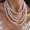 Collar de Perlas de Múltiples Capas Cruzadas Europeo y Americano Cadena para Clavícula Estilo Francés Elegante Collar con Sentido de Diseño de Nicho para Mujeres Venta al por Mayor