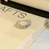 Anel curvo de diamante azul em formato de gota d'água, cool e deslumbrante, para mulheres, design de nicho, anel para o dedo indicador, sensação de luxo leve e alta qualidade