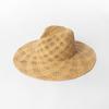 Europa y Estados Unidos transfronterizo súper ventas moda casual tejido a mano rafia flor hueca sombrero de paja exterior playa protector solar