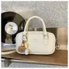 Fabricante Transfronteiriço Outono e Inverno 2025 Nova Bolsa Bowling Feminina Bolsa Boston Almofada de Nicho Bolsa de Mão e Bolsa Transversal da Moda