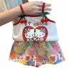 Top de tirantes floral Dopamine Verano Holgado Vacaciones en la playa Hello Kitty Dibujos animados de alto valor Lindo Conjunto de dos piezas