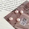Atmósfera de primavera pendientes de perla de panecillo rosa alto sentido temperamento pendientes vintage 2025 nuevos pendientes para mujer