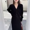 Comercio exterior transfronterizo otoño e invierno nueva moda conjunto casual de punto para mujer, conjunto de dos piezas de falda y suéter adelgazante de color liso