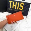 Carteira Longa de Couro de Vaca Camada Superior Feminina 2025 Nova Ultra-fina Bolsa de Mão para Celular Porta-Cartões Couro Genuíno Carteira Simples com Zíper