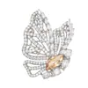 Broche de Mariposa de Alta Gama con Piedras Preciosas de Colores y Medio Ala Extendida, Diseño Versátil y Elegante para Trajes de Mujer