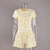 Otoño e Invierno 2026 Nuevos Productos Europeos y Americanos Conjunto de Dos Piezas de Shorts de Punto Ajustados de Manga Corta Pijama de Algodón Puro Ropa Casual para el Hogar para Mujer