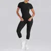 Conjunto de dos piezas de canalé ajustado bestseller transfronterizo con cuello redondo, mangas cortas, mallas de yoga ajustadas, atuendo deportivo de Pilates y fitness para mujer