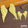 Famosos accesorios de joyería de estilo étnico tocado de muñeca material DIY corona de fénix dorado alas de dragón y fénix pieza de flor colgante