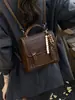 Bolso Cruzado Pequeño Casual Elegante Transfronterizo para Mujer Otoño 2026 Nuevo Bolso Cruzado de Moda Versátil con Textura Mochila de Viaje
