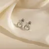 Nuevos pendientes de nicho retro estilo Tíbet con patrón de tornillo incrustado de diamantes, simples y únicos, estilo étnico creativo, elegantes ear cuffs para mujer