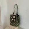 Bolsa de mano de gran capacidad estilo coreano para el día a día 2026, nueva bolsa de lunares de nicho, bolsa de hombro/axila de gran capacidad estilo femenino