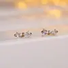 Pendientes de botón con lazo de lujo cruzado súper brillantes de venta caliente, moda, pequeños, exquisitos, de circonita, simples, versátiles para el día a día