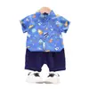 Ropa Infantil Transfronteriza Verano Nuevo Estilo Ropa de Verano para Niños, Bebés y Niños, Camisa Casual de Manga Corta Traje Conjunto de Dos Piezas