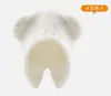 Otoño e invierno nuevo lindo oso sombrero cálido protección facial orejas pequeñas sombrero de lana sombrero de invierno japonés y coreano sombrero de punto versátil