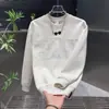 Sudadera elegante y casual, nueva colección de otoño, cuello redondo, diseño patchwork con estampados, de alta calidad, top de hombre de moda de una marca popular