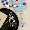 Llavero con colgante de corazón para niña, bonito estilo Ins, con carcasa decorativa para teléfono móvil, cadena con adornos colgantes que combinan con todo, venta al por mayor