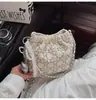 Al por mayor transfronterizo 2025 nuevo modelo bolsa de pedrería, bolso de hombro único, bolso cruzado, cadena de moda, bolso tipo almohada simple y elegante