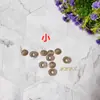 Ojos de muñeca accesorios diy caricatura comercial diez mil espiral hecho a mano accesorios negros material de lana joyería diy