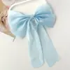 Bestseller internacional Amazon cetim verão estilo de alta qualidade mais vendidos em feiras, fabricante Yiwu atacado presilhas de cabelo com laço para mulheres