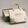 Caja de regalo de mano colorida para regalo navideño, fábrica de origen, en stock, engrosada, ecológica, exquisita, de alta gama, lujo ligero, duradera