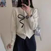 Jaqueta Cardigan de Tricô Jacquard com Gola Redonda, Laço Doce Redutor de Idade, Cor Contrastante Dongdaemun da Coreia do Sul para Mulheres