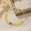Pulsera tejida de mariposa al por mayor transfronterizo, pulsera de cuentas para parejas y amigos, pulsera de cordón de cera ajustable con mariposa de aleación