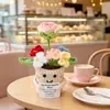 Muñecas de plantas tejidas a mano transfronterizas, decoraciones de plantas tejidas, flores artificiales de ganchillo para fiestas