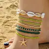 Pulsera trenzada con cuentas de concha estilo bohemio nuevo transfronterizo, estilo playa, juego de siete piezas de cuentas de arroz y estrellas de mar