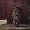 Marca de Árbol de Agarwood al por mayor Marca Guanyin de Pie Colgante para Coche Piezas de Mano Montadas en Coche Artesanías Talladas y Joyería