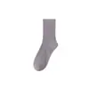 Calcetines de otoño e invierno para mujer hasta la pantorrilla, engrosados y cálidos, calcetines de algodón para mujer, color liso, calcetines largos versátiles de cintura media, calcetines Zhuji